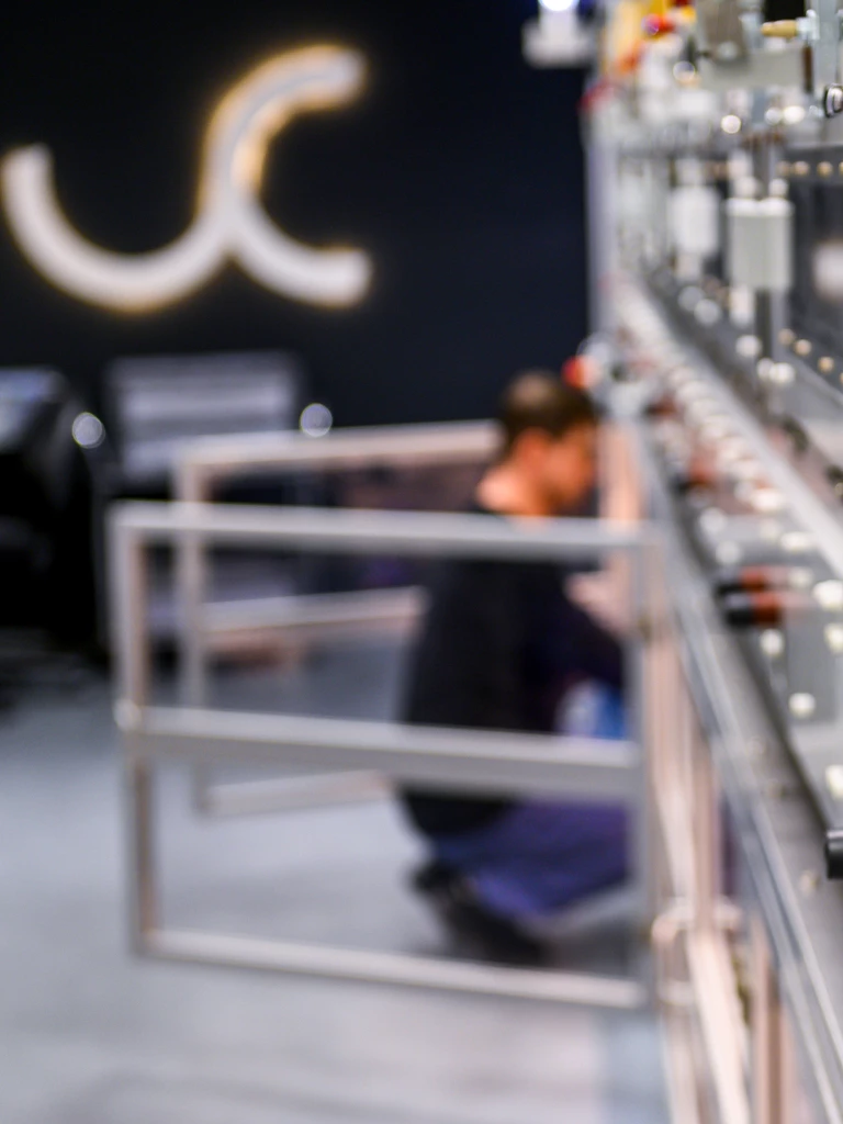 Image: Determination of solids, Viscosity analysis, Moisture determination of electrodes, Peel tests for examining adhesive properties, Vacuum dryers, Pilot coaters, Inline coating weight controll, Lab and pilot calendar rollers, State-of-the-art mixing processes, Gloveboxes, Extruders.